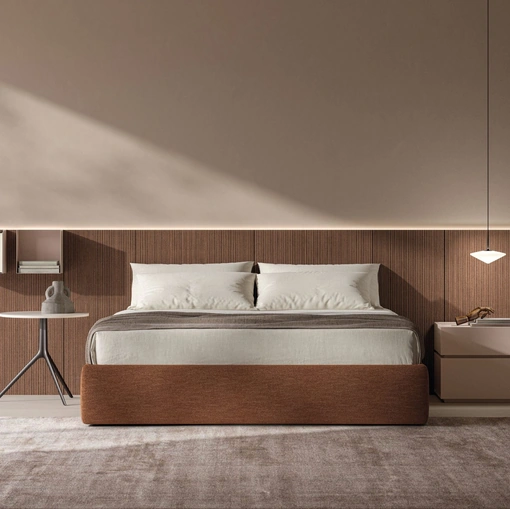 Letto Sommier in tessuto con boiserie in materico Noce cannettato di Tagliabue Mobili