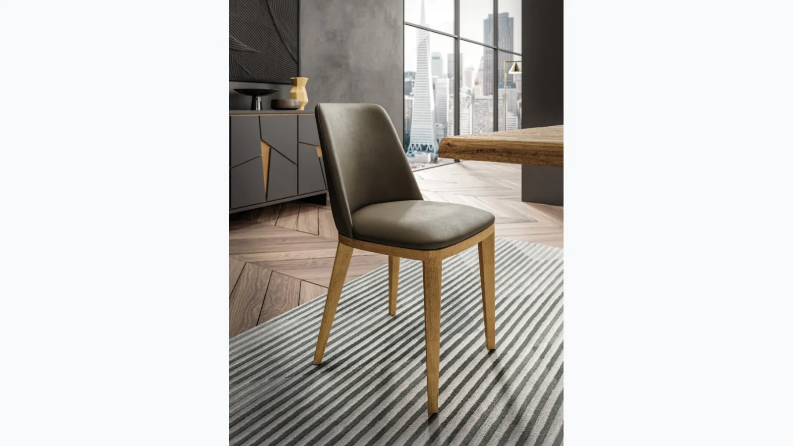 Sedia Nesty2 in pelle con gambe in legno di FGF Mobili